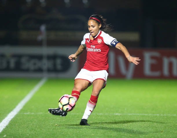 Alex Scott as Arsenal captain.