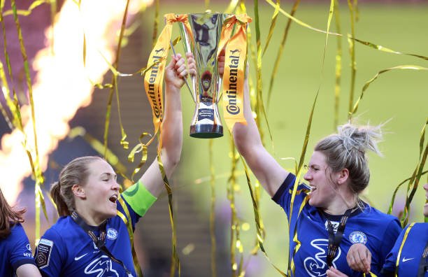 Chelsea centre-backs Magdalena Eriksson and Millie Bright lift the Conti Cup trophy