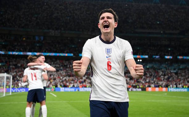 LONDON, ENGLAND - JULY 07: Harry Maguire of England celebrates after victory in the UEFA Euro 2020 Championship Semi-final match between England and Denmark at Wembley Stadium on July 07, 2021 in London, England. (Photo by Shaun Botterill - UEFA/UEFA via Getty Images)