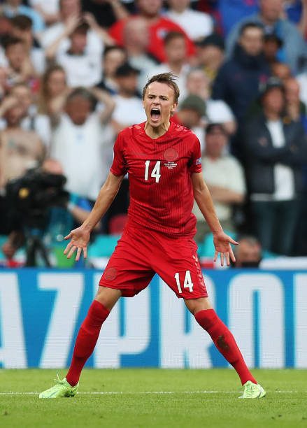 LONDON, ENGLAND - JULY 07: Mikkel Damsgaard of Denmark celebrates after scoring their side's first goal during the UEFA Euro 2020 Championship Semi-final match between England and Denmark at Wembley Stadium on July 07, 2021 in London, England. (Photo by Alex Morton - UEFA/UEFA via Getty Images)